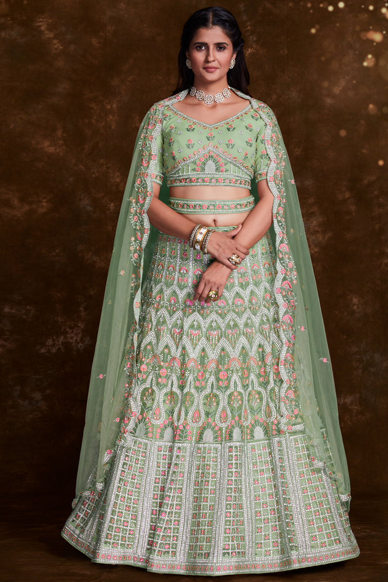 Embroidered Wedding Wear Lehenga Choli In Green Net Fabric