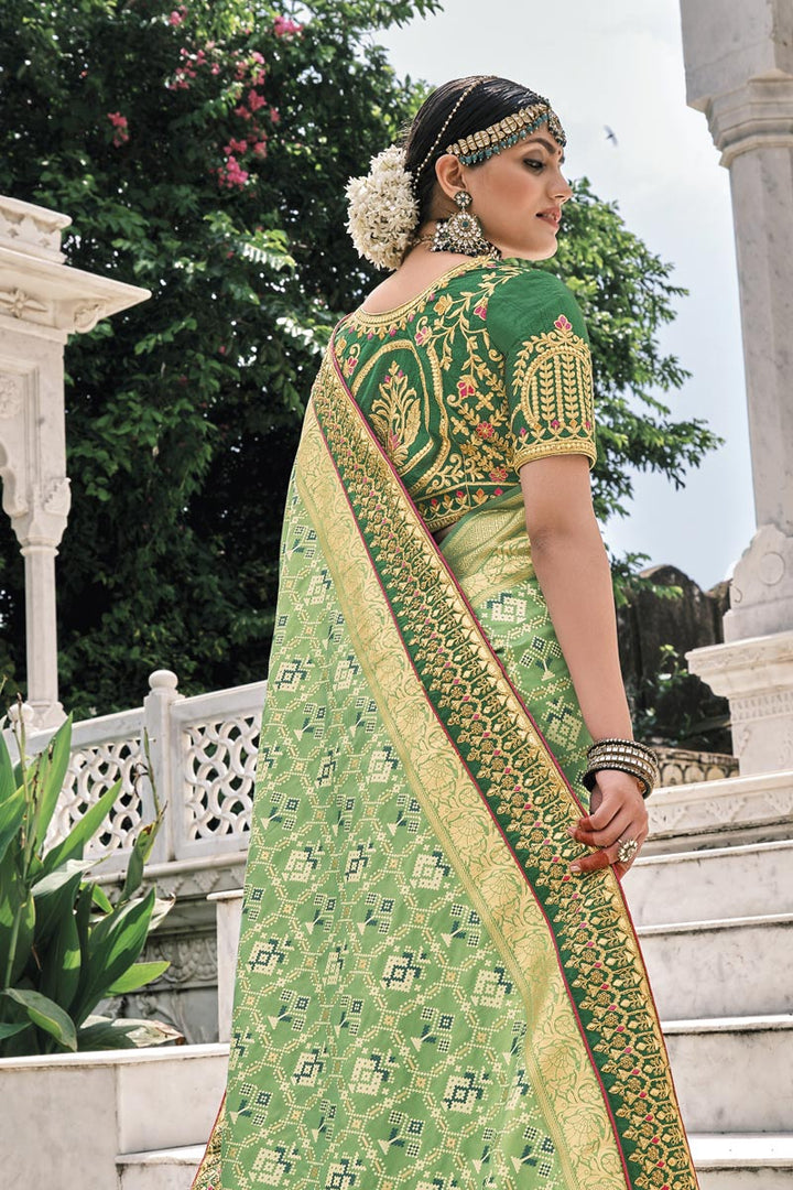Silk Fabric Sea Green Color Sangeet Wear Border Work Saree
