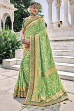 Load image into Gallery viewer, Silk Fabric Sea Green Color Sangeet Wear Border Work Saree
