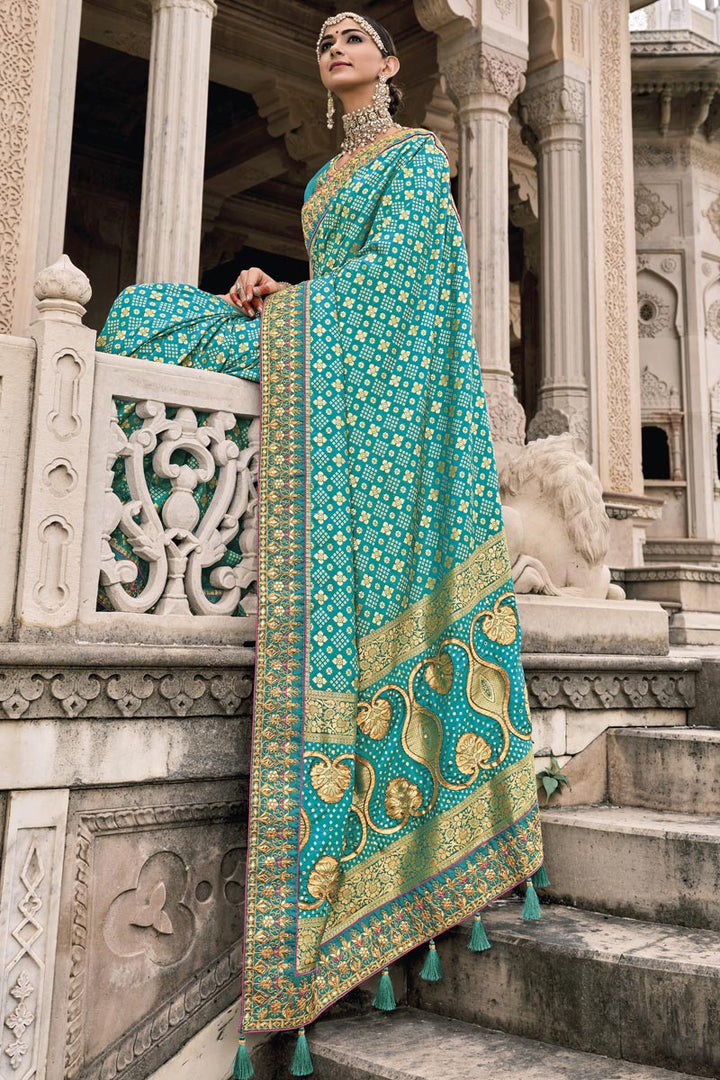Silk Fabric Cyan Color Border Work Reception Wear Saree