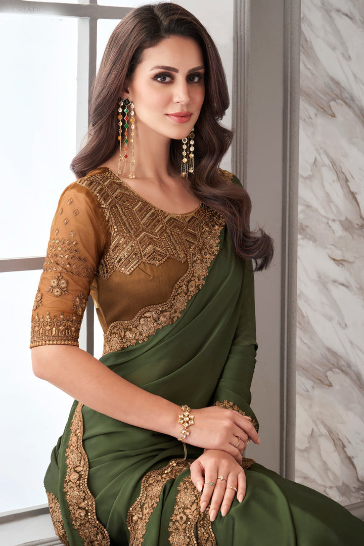 Green Color Georgette Fabric Saree With Imposing Border Work