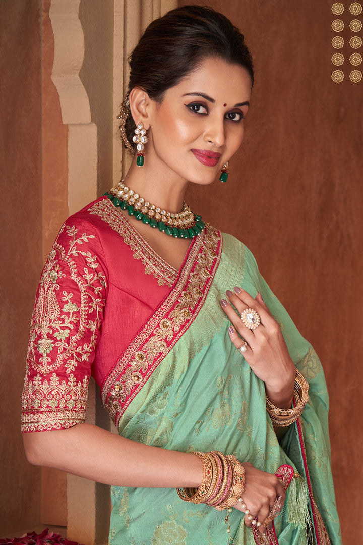 Sea Green Weaving Work Dola Silk Fabric Saree