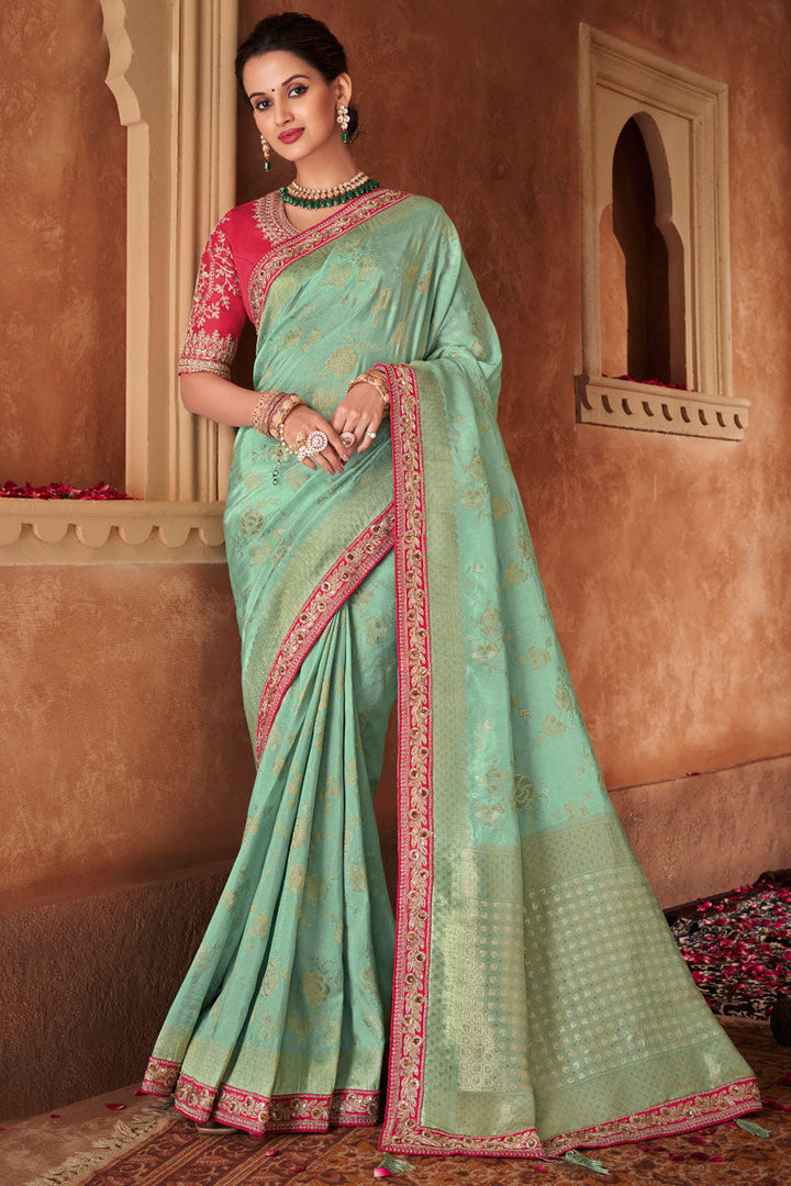 Sea Green Weaving Work Dola Silk Fabric Saree