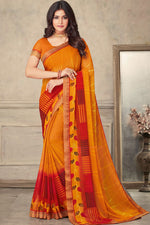 Load image into Gallery viewer, Printed Work On Captivating Chiffon Fabric Saree In Orange Color
