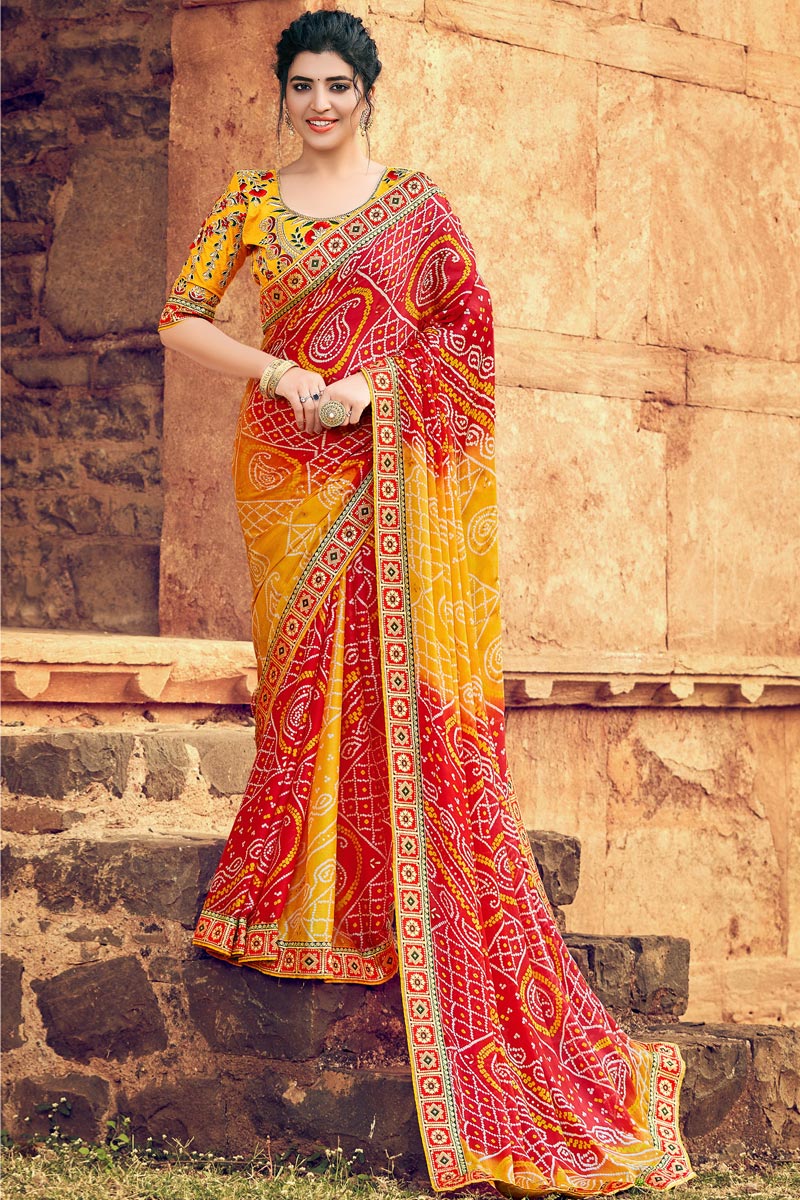 Enticing Yellow Color Georgette Fabric Bandhani Style Saree With Weaving Work