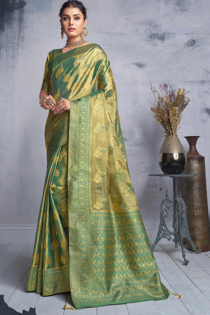 Green Color Fascinating Weaving Designs Organza Saree