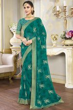 Load image into Gallery viewer, Teal Color Festive Wear Charming Georgette Fabric Saree With Printed Work
