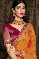 Load image into Gallery viewer, Brasso Fabric Classic Orange Color Saree With Lace Border Work
