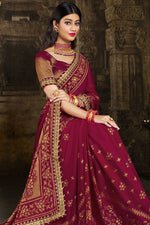 Load image into Gallery viewer, Maroon Color Brasso Fabric Saree With Lace Border Work
