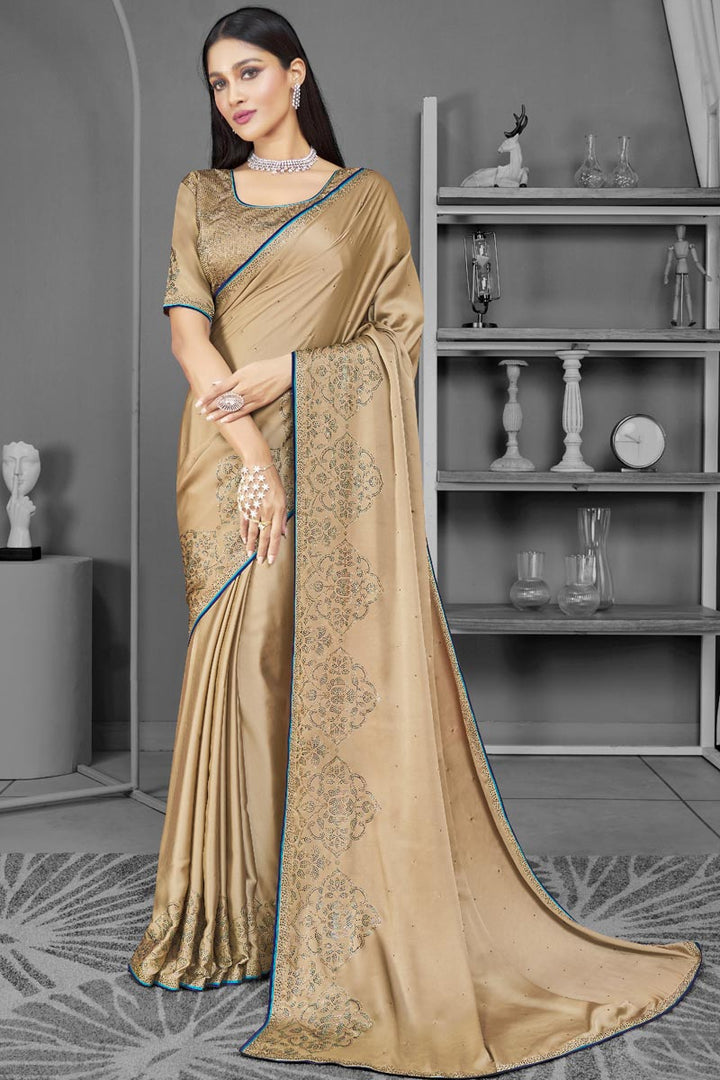 Beige Color Stone Work On Satin Fabric Sangeet Wear Stunning Saree