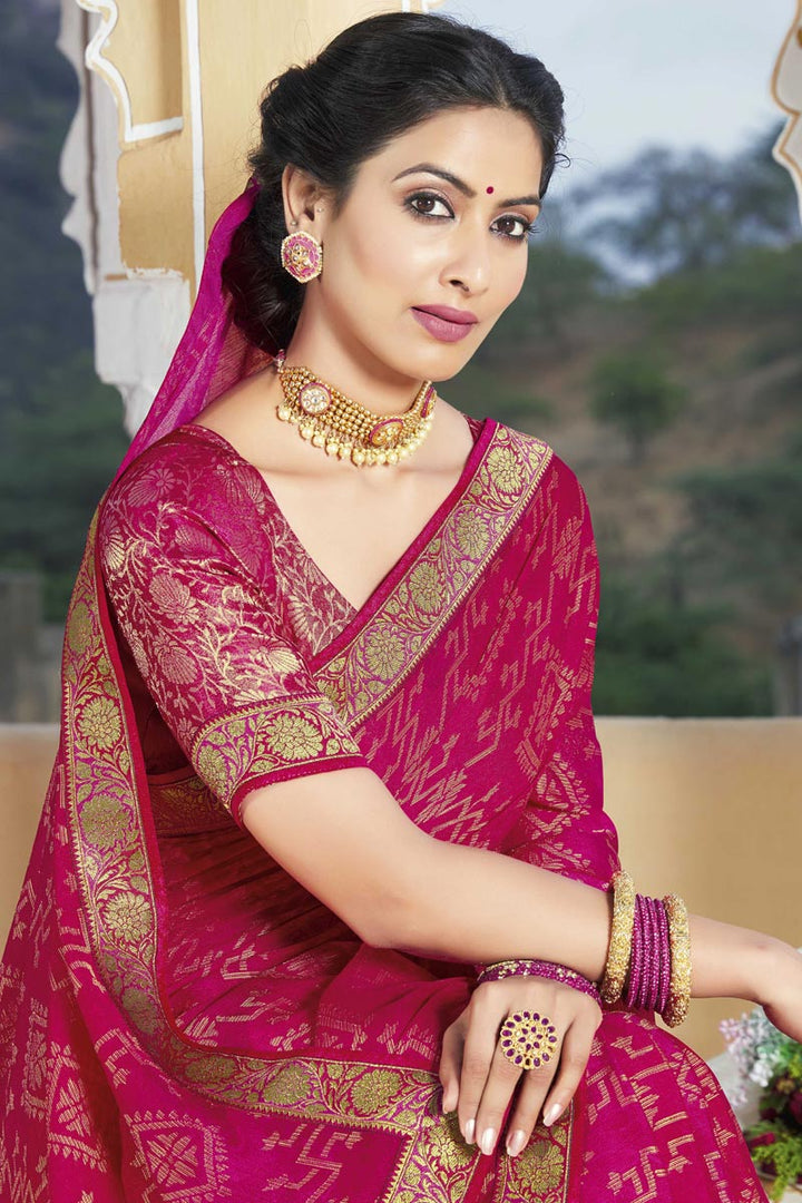 Brasso Fabric Dazzling Rani Color Sangeet Wear Saree With Lace Work