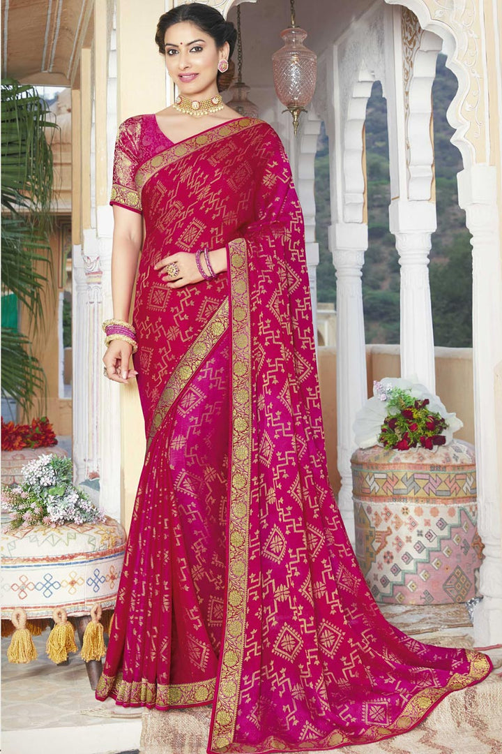 Brasso Fabric Dazzling Rani Color Sangeet Wear Saree With Lace Work