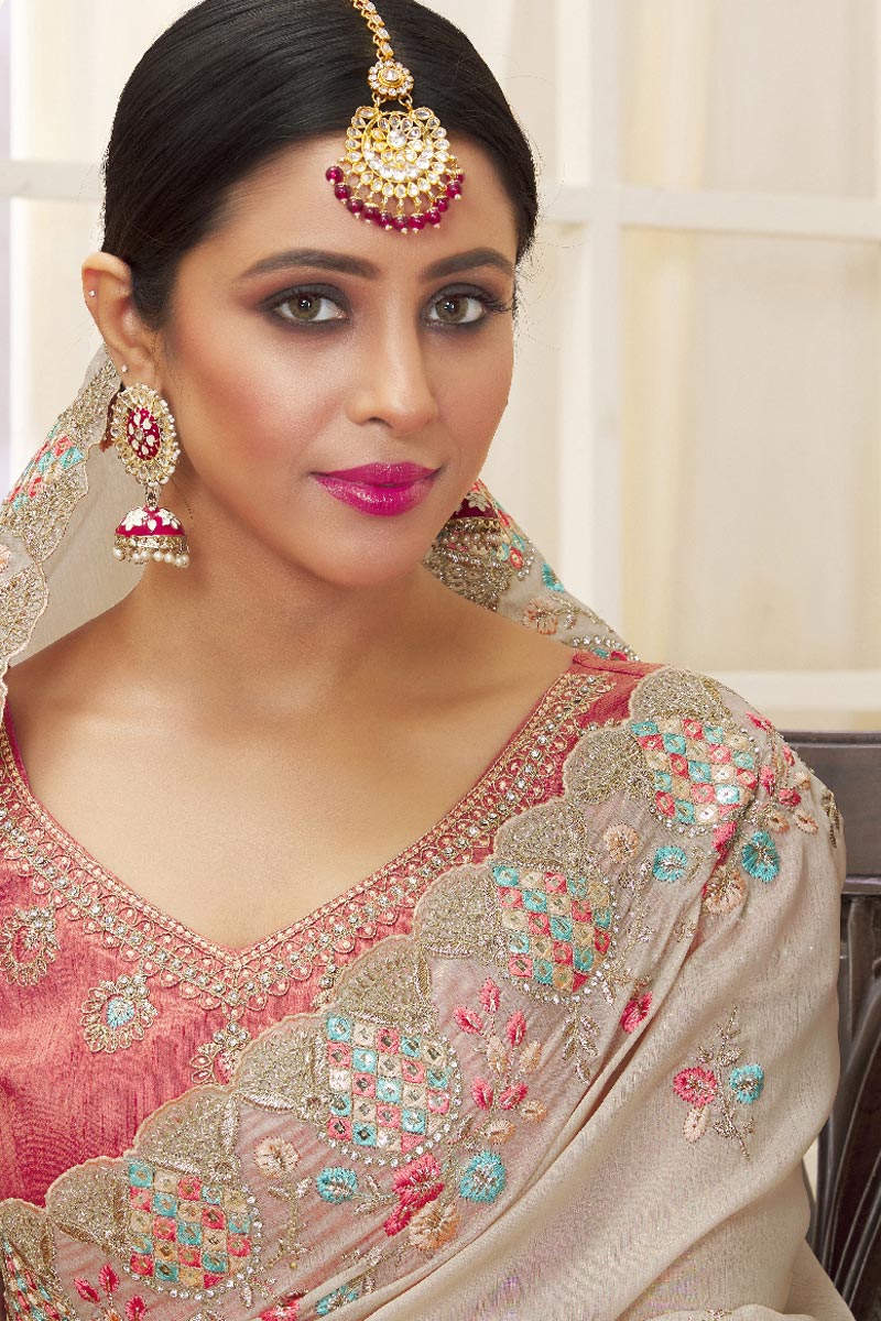 Attractive Embroidered Work On Function Wear Cream Color Saree In Tissue Fabric
