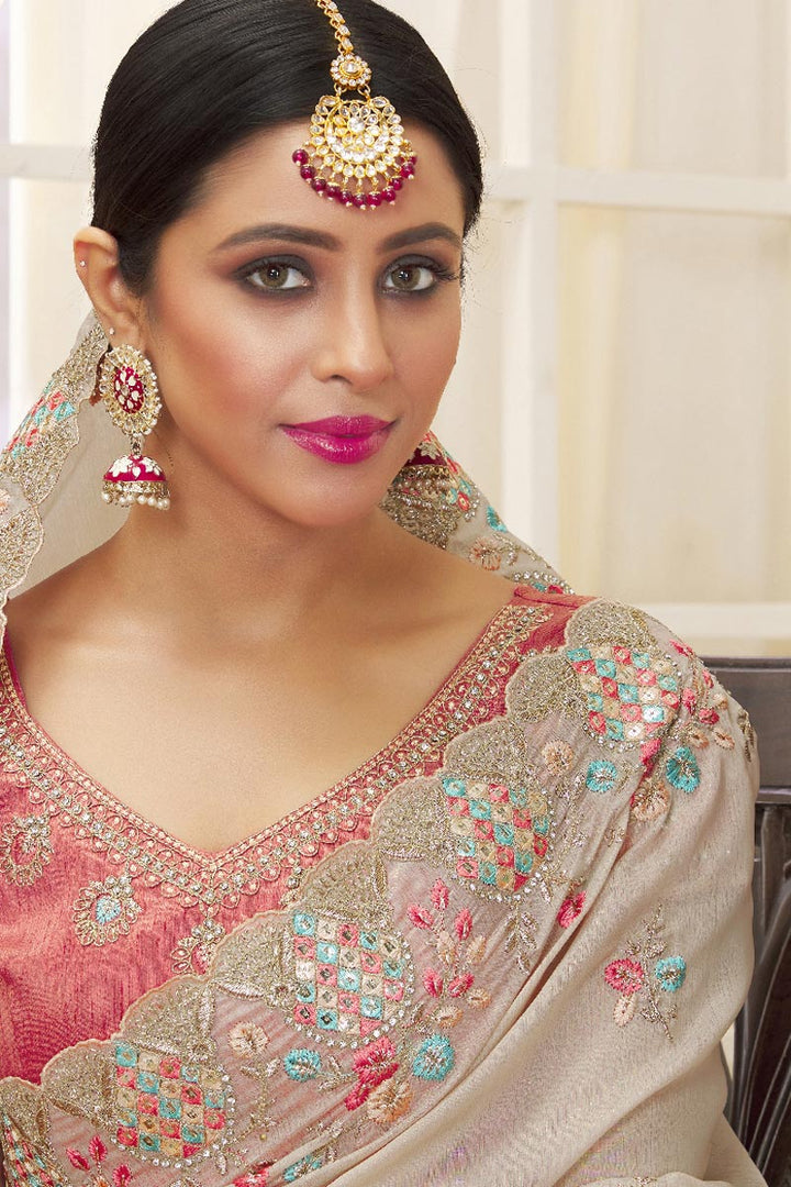Attractive Embroidered Work On Function Wear Cream Color Saree In Tissue Fabric