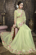 Load image into Gallery viewer, Dazzling Green Color Embroidered Border Work Saree In Tissue Fabric
