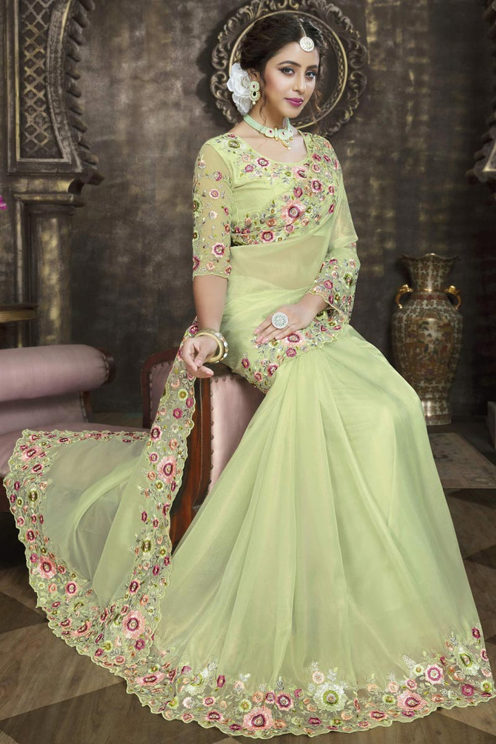Dazzling Green Color Embroidered Border Work Saree In Tissue Fabric