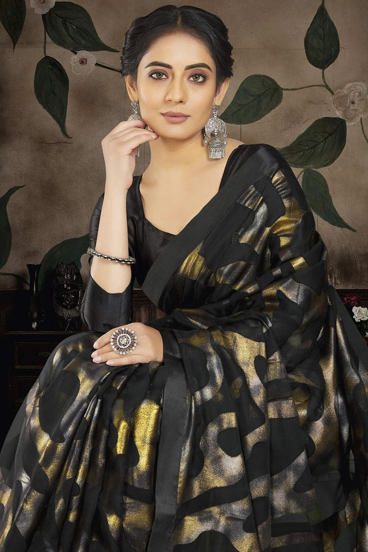 Brasso Fabric Black Color Delicate Party Style Saree
