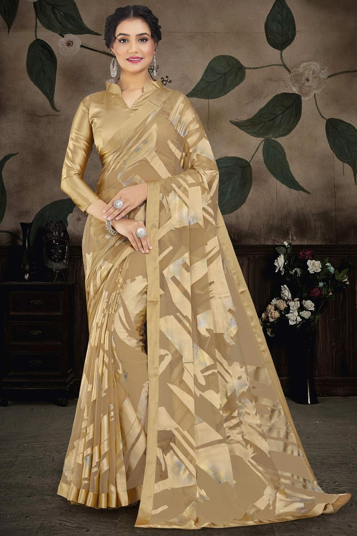 Brasso Fabric Cream Color Soothing Party Style Saree