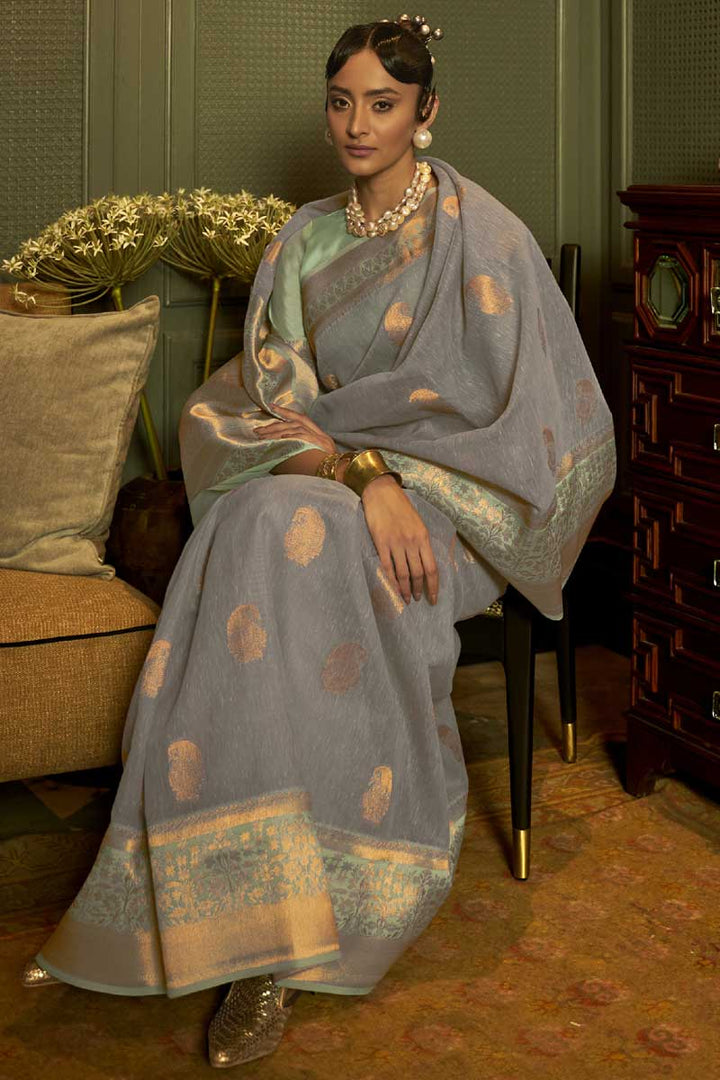 Grey Color Linen Fabric Sangeet Wear Magnificent Weaving Work Saree