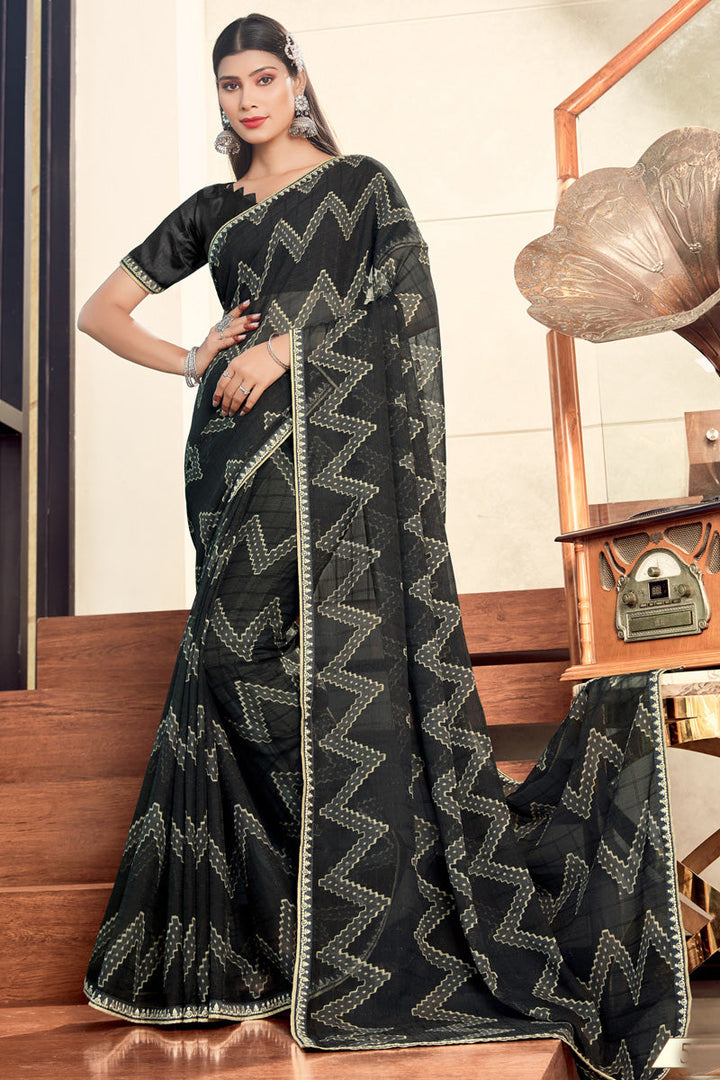 Winsome Georgette Black Color Casual Look Printed Saree