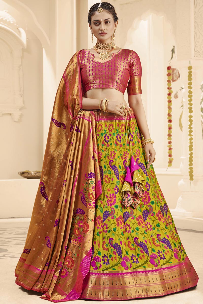Weaving Work Reception Wear Majestic Lehenga Choli In Green Silk Fabric