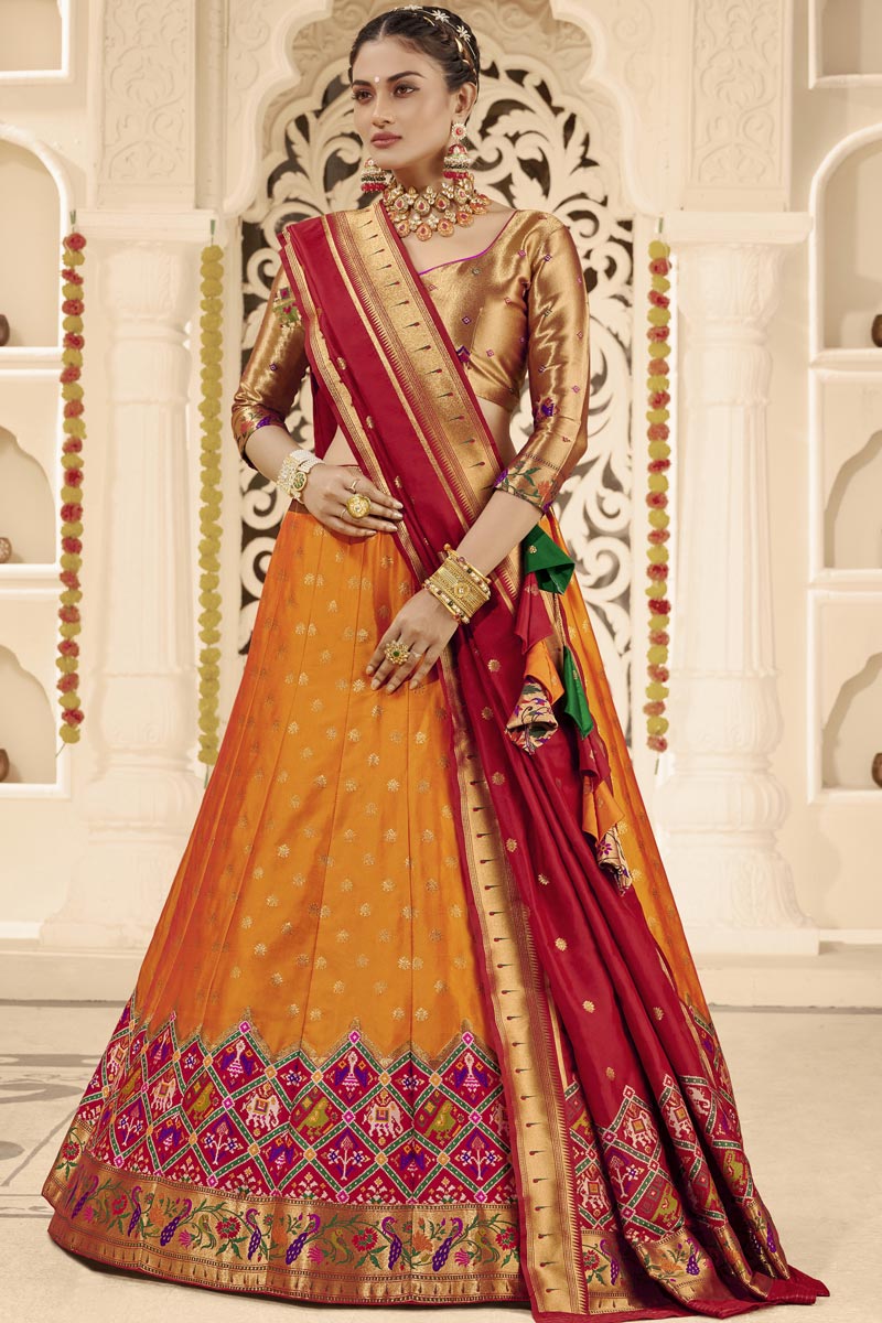 Pretty Silk Fabric Weaving Work Sangeet Wear Lehenga Choli In Mustard Color