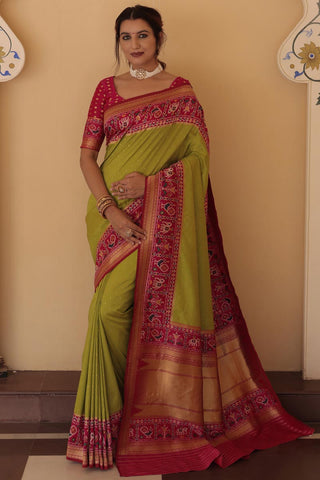 Weaving Work On Function Wear Mehendi Green Color Enthralling Saree In Silk Fabric