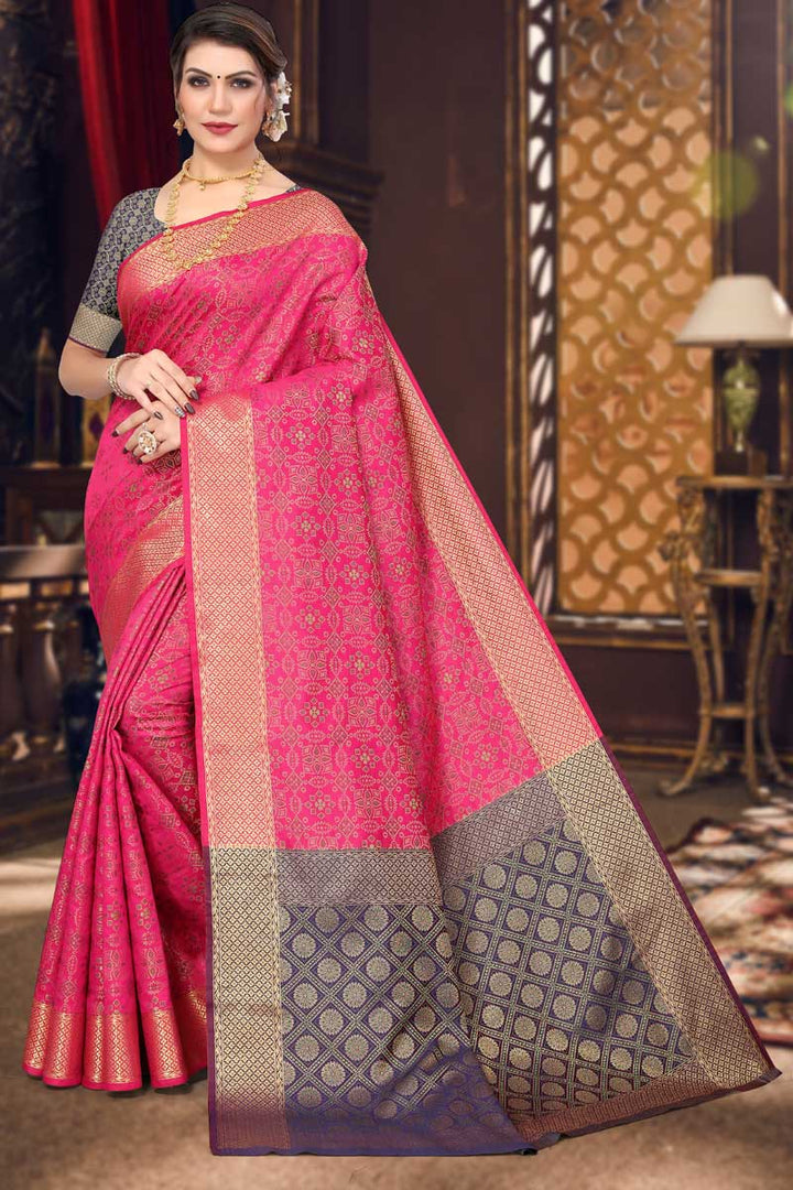 Tempting Patola Silk Fabric Rani Color Saree In Festival Wear