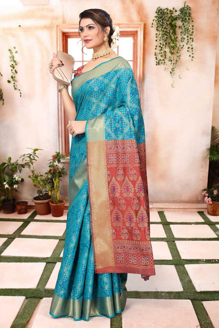 Creative Jacquard Work On Patola Silk Fabric Saree In Cyan Color