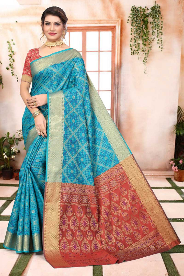 Creative Jacquard Work On Patola Silk Fabric Saree In Cyan Color