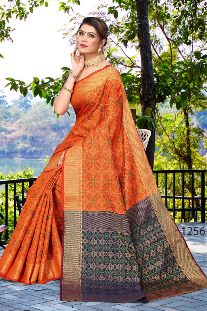Marvelous Jacquard Work On Patola Silk Fabric Saree In Orange Color