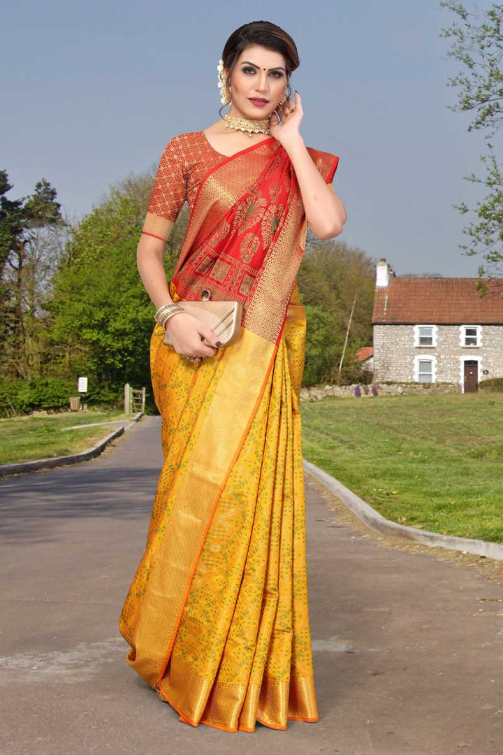 Bewitching Jacquard Work On Yellow Color Saree In Patola Silk Fabric