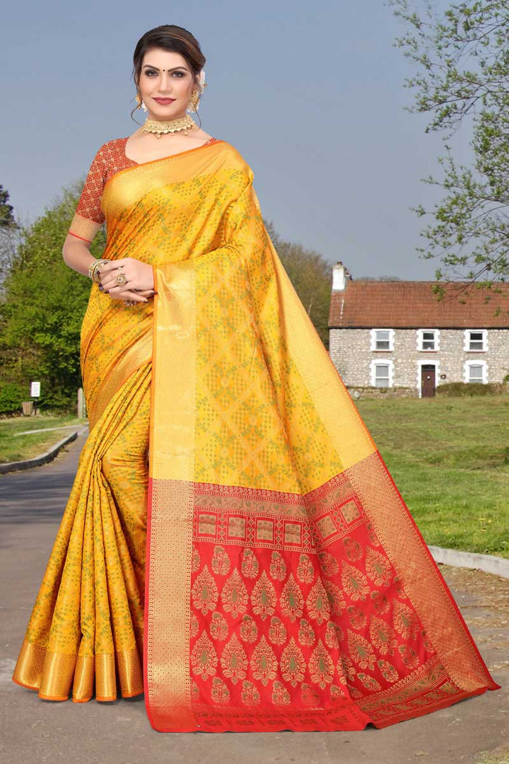 Bewitching Jacquard Work On Yellow Color Saree In Patola Silk Fabric