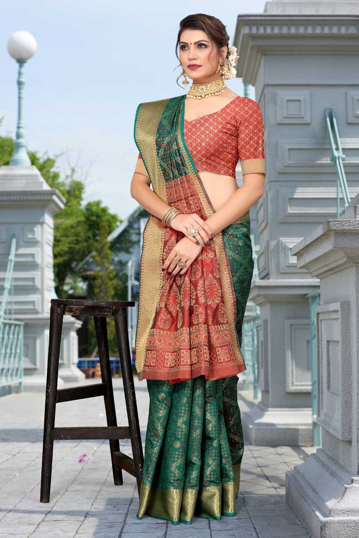 Engaging Teal Color Patola Silk Fabric Saree With Jacquard Work
