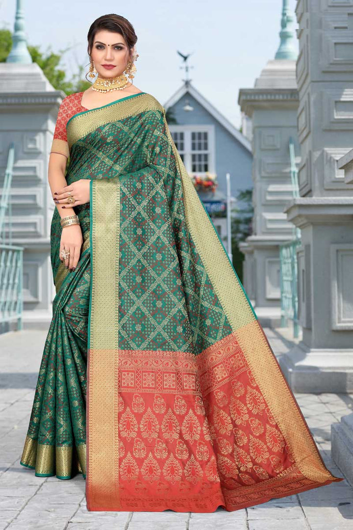Engaging Teal Color Patola Silk Fabric Saree With Jacquard Work