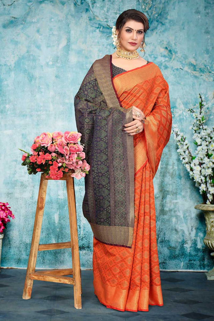 Festival Wear Art Silk Fabric Orange Color Intricate Patola Style Saree