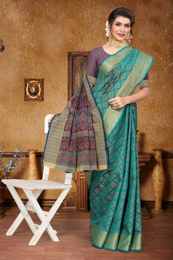 Festive Wear Art Silk Fabric Teal Color Engaging Patola Style Saree