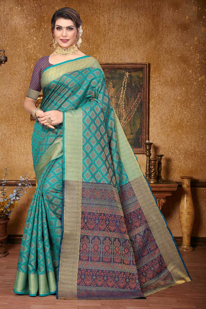 Festive Wear Art Silk Fabric Teal Color Engaging Patola Style Saree
