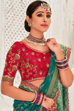 Load image into Gallery viewer, Embroidered Designs On Organza Fabric Sangeet Wear Superior Saree In Cyan Color
