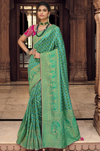 Cyan Color Party Wear Weaving Work Silk Fabric Saree With Embroidered Blouse