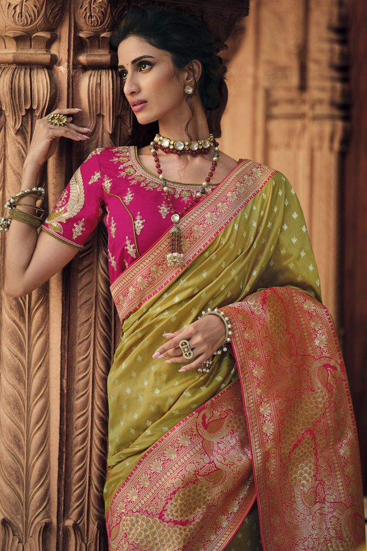 Silk Fabric Function Wear Green Color Weaving Work Saree With Embroidered Blouse