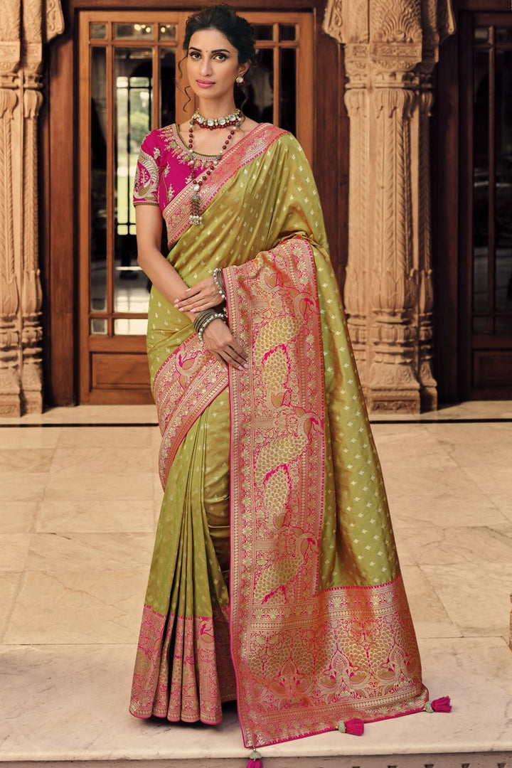 Silk Fabric Function Wear Green Color Weaving Work Saree With Embroidered Blouse