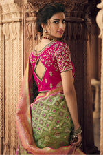 Load image into Gallery viewer, Party Wear Green Color Silk Fabric Weaving Work Saree With Embroidered Blouse
