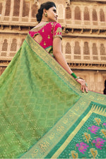 Load image into Gallery viewer, Green Color Sangeet Wear Silk Fabric Weaving Work Saree With Embroidered Blouse
