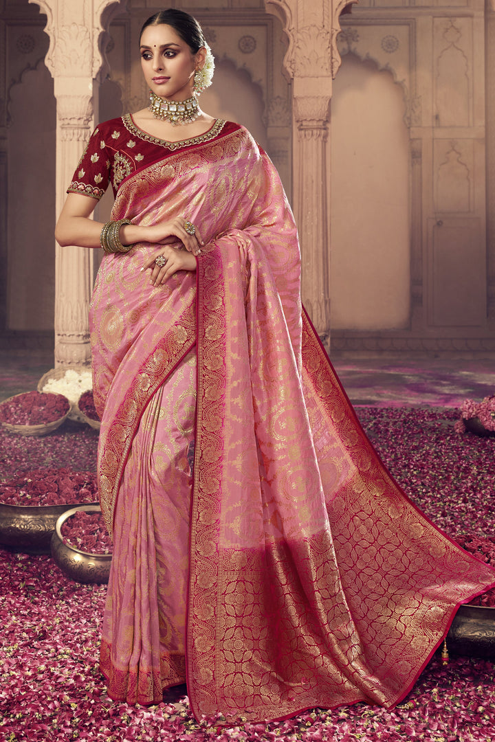 Art Silk Fabric Pink Color Heavy Weaving Work Festive Wear Trendy Saree With Embroidered Blouse