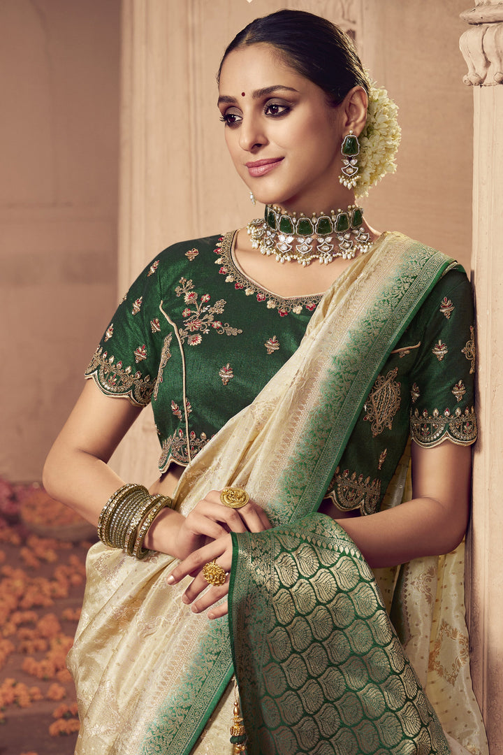 Art Silk Fabric Wedding Wear Off White Color Fancy Heavy Weaving Work Saree With Embroidered Blouse