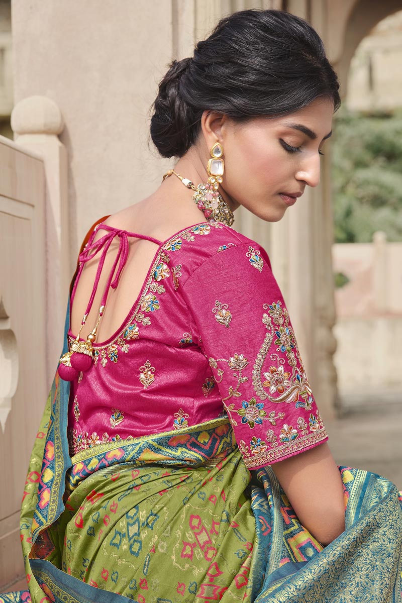 Silk Fabric Weaving Work Wonderful Saree In Olive Color