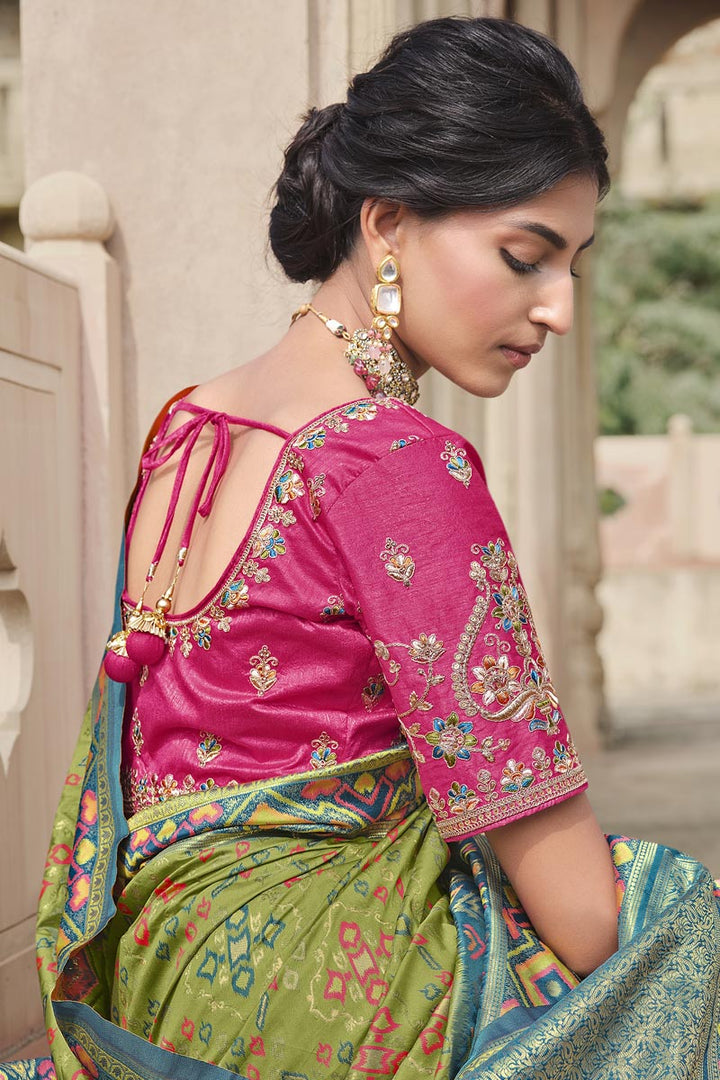 Silk Fabric Weaving Work Wonderful Saree In Olive Color