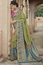 Load image into Gallery viewer, Silk Fabric Weaving Work Wonderful Saree In Olive Color
