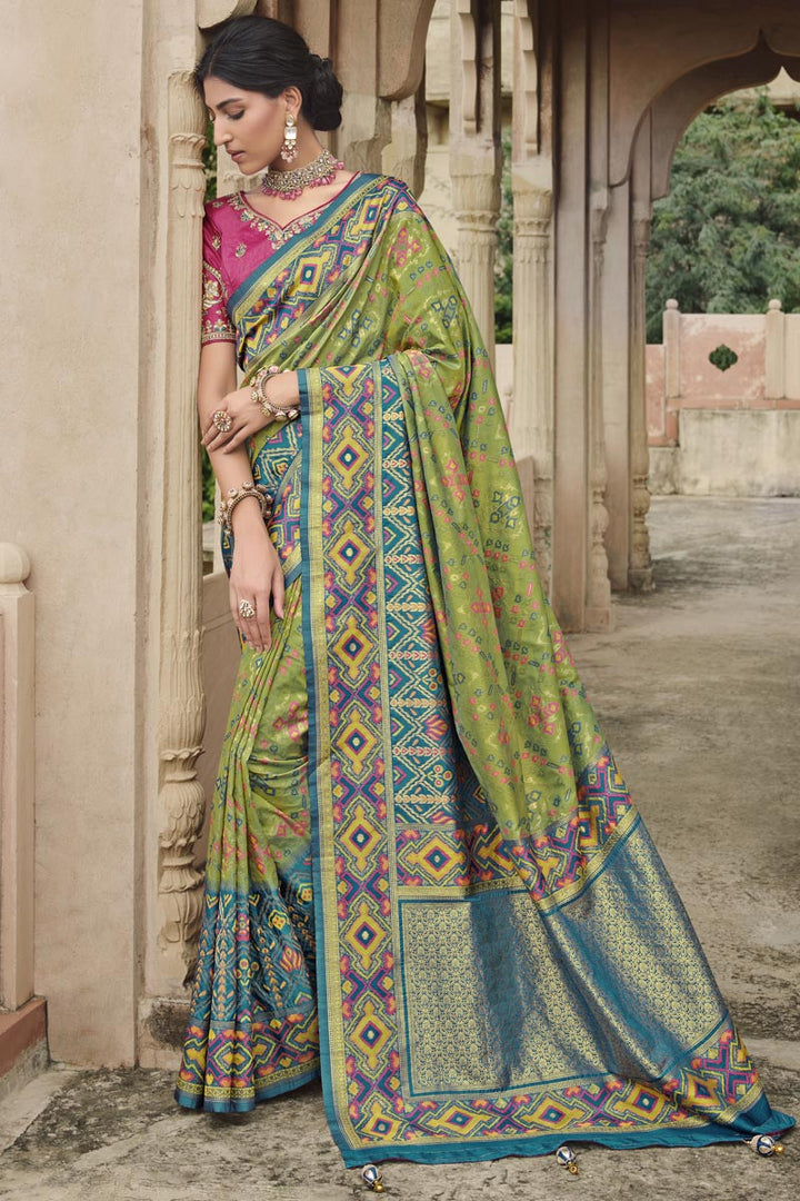 Silk Fabric Weaving Work Wonderful Saree In Olive Color